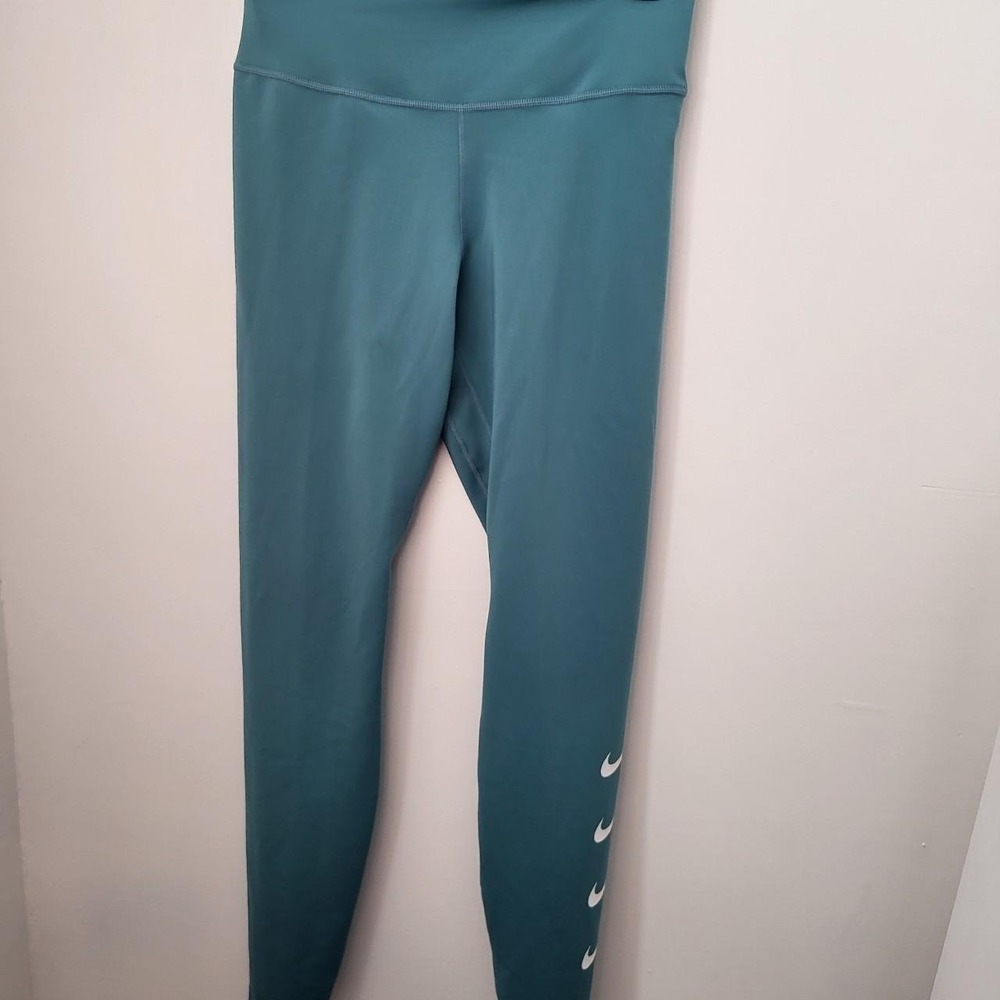 Nike Teal Dryfit Leggings Size Medium Inseam 26 inches Stretches Waist 26 inches